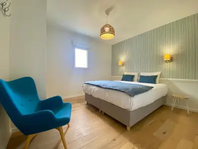 Un ou plusieurs lits dans un hébergement de l'établissement Gîte cosy à 300m de la plage, bain nordique, poêle à bois, borne électrique, proche centre de Pornic - FR-1-306-1278