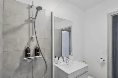 Salle de bains dans l'établissement Centre-ville - Fibre - Netflix - T2 LE RIEFFEL
