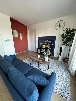 Coin salon dans l'établissement Le Contrie - Bel appartement avec terrasse
