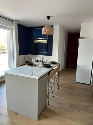 Cuisine ou kitchenette dans l'établissement Le Contrie - Bel appartement avec terrasse