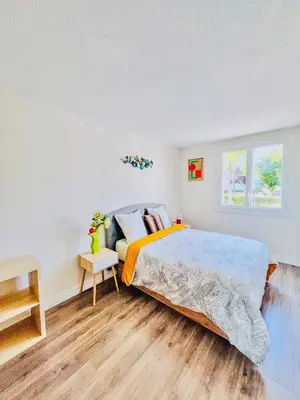 Un ou plusieurs lits dans un hébergement de l'établissement NOZA Appartement 65m2, 2 chambres - RDC, Parking gratuit, Nantes agglo Rezé