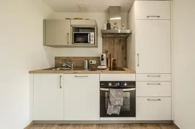 Cuisine ou kitchenette dans l'établissement Grange Rénovée 2 Pers-LePetitLieu-Gîte Le 411