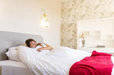 Un ou plusieurs lits dans un hébergement de l'établissement Auberge le Prieuré des Gourmands