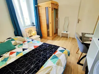Un ou plusieurs lits dans un hébergement de l'établissement 2 chambres Centre Chateaubriant Sauna