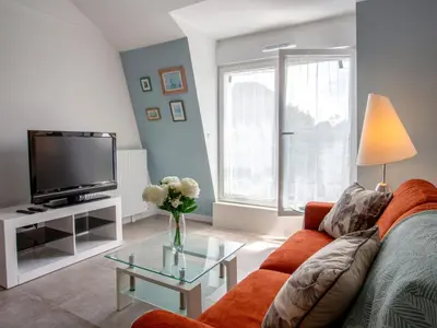 Télévision ou salle de divertissement dans l'établissement Apartment Côté Port by Interhome