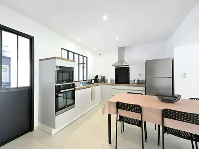 Cuisine ou kitchenette dans l'établissement L'Échappée Belle Élégance, Familiale, Conviviale