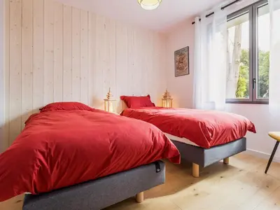 Un ou plusieurs lits dans un hébergement de l'établissement Ancien corps de ferme rénové avec jardin, terrasse et recharge EV, à 24 km de Nantes - FR-1-306-1282