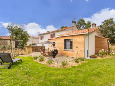 Jardin de l'établissement Ancien corps de ferme rénové avec jardin, terrasse et recharge EV, à 24 km de Nantes - FR-1-306-1282