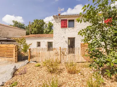 Jardin de l'établissement Ancien corps de ferme rénové avec jardin, proche de Nantes, wifi, borne de recharge et animaux acceptés. - FR-1-306-1280