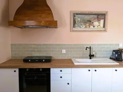 Cuisine ou kitchenette dans l'établissement Challain