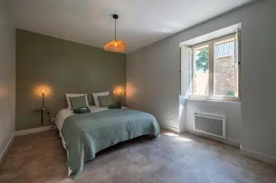 Un ou plusieurs lits dans un hébergement de l'établissement La Villa au Grand Chêne - Charmante maison pour 10p