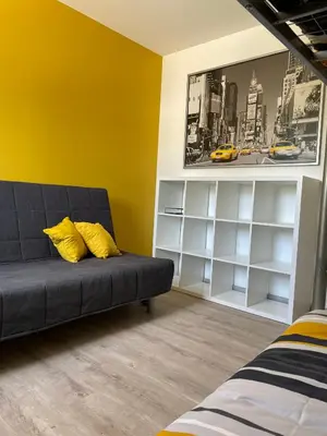 Coin salon dans l'établissement Gîte climatisé DUNE ET PLAGE jqà 12 personnes