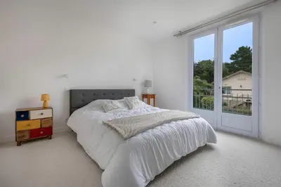 Un ou plusieurs lits dans un hébergement de l'établissement Maison et jardin, 600m de la mer, St Brevin