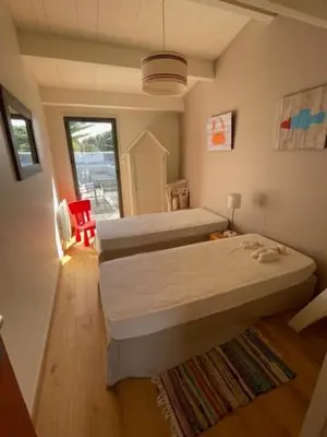 Un ou plusieurs lits dans un hébergement de l'établissement Maison de Vacances des Centaurées