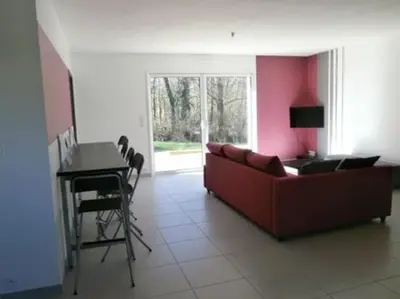Coin salon dans l'établissement Gîte LMNP Zehr