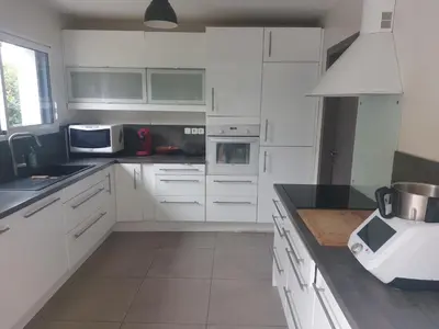 Cuisine ou kitchenette dans l'établissement Maison 6 personnes, proche Nantes et mer