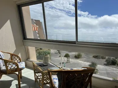 Balcon ou terrasse dans l'établissement L Arc en Ciel