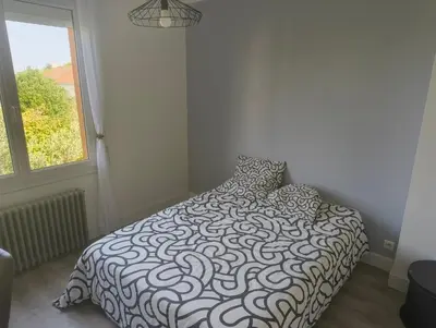 Un ou plusieurs lits dans un hébergement de l'établissement Chambre Gabare proche Nantes