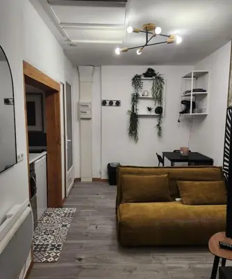 Coin salon dans l'établissement La petite loge de l'ile