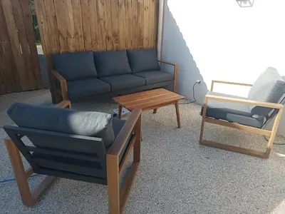 Coin salon dans l'établissement Gite maison Simon 30' Puy du Fo climatisé