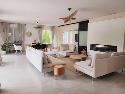 Coin salon dans l'établissement La villa des Taillis, 10 pers