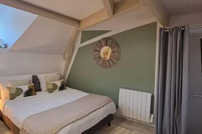 Un ou plusieurs lits dans un hébergement de l'établissement Studio NOTRE-DAME 3 cœur de ville