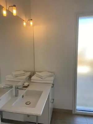 Salle de bains dans l'établissement SixTer