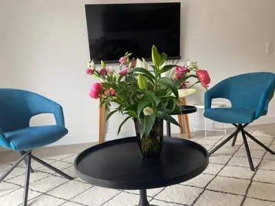 Télévision ou salle de divertissement dans l'établissement SixTer