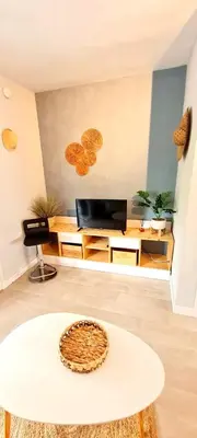 Télévision ou salle de divertissement dans l'établissement Évasion, Studio Cosy près de la Plage