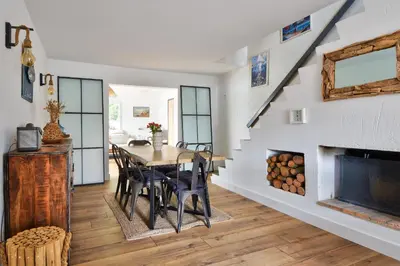 Coin salon dans l'établissement Jolie maison pour 7 - 300 m de la plage - Dunes