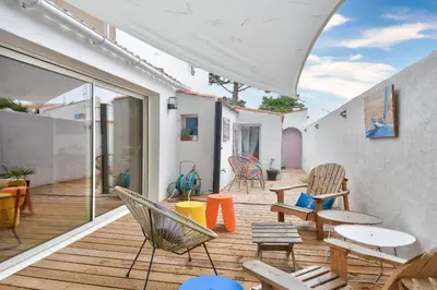 Balcon ou terrasse dans l'établissement Jolie maison pour 7 - 300 m de la plage - Dunes