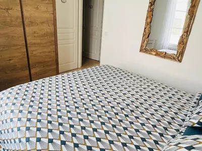 Un ou plusieurs lits dans un hébergement de l'établissement Villa avec piscine privée, 3 chambres à Saint-Jean-de-Monts - FR-1-323-552
