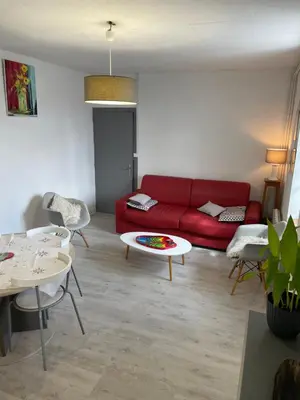Coin salon dans l'établissement Gîte en bord de lac