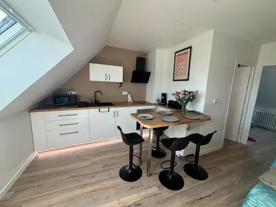 Cuisine ou kitchenette dans l'établissement T2 Centre ville proche gare - Tramway au pied