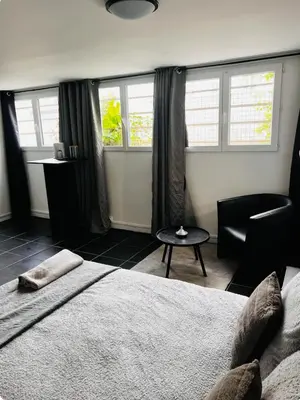 Un ou plusieurs lits dans un hébergement de l'établissement Studio proche du front de mer en plein centre-ville
