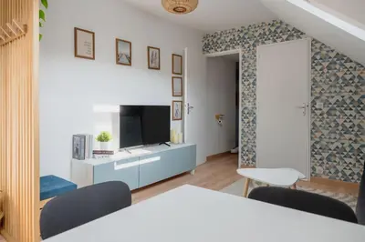 Un ou plusieurs lits dans un hébergement de l'établissement Suite Sous Velux T2