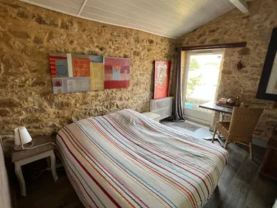 Un ou plusieurs lits dans un hébergement de l'établissement Chambre chez Steeve
