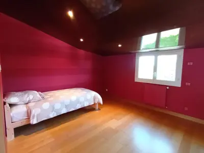 Un ou plusieurs lits dans un hébergement de l'établissement Maison de la villa à la fosse à l'âne 5 chambres