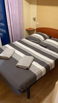 Un ou plusieurs lits dans un hébergement de l'établissement Joli Mobil-Home avec terrain terrasse 10min du Puy duFou