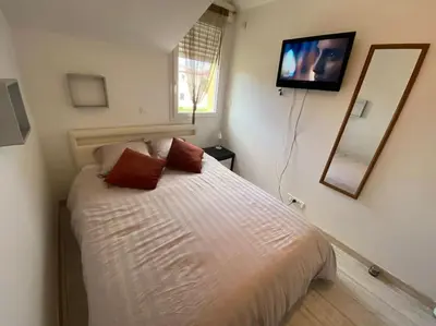 Un ou plusieurs lits dans un hébergement de l'établissement Appartement T3 individuel avec accès piscine et jardin privés