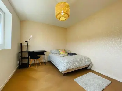 Un ou plusieurs lits dans un hébergement de l'établissement Casa Spacieuse