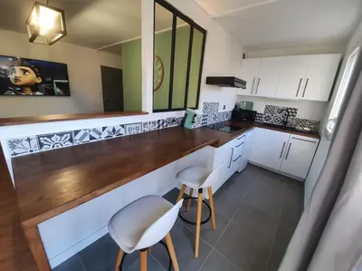 Cuisine ou kitchenette dans l'établissement Le studio 40