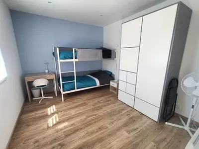 Un ou plusieurs lits dans un hébergement de l'établissement Maison 5 pers neuve 300m de la mer