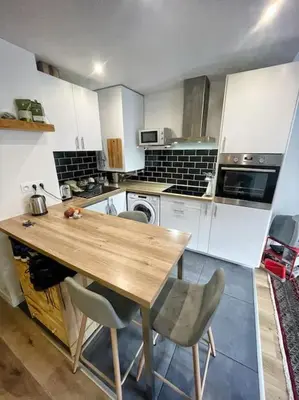 Cuisine ou kitchenette dans l'établissement Le repère du voyageur