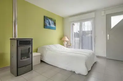 Un ou plusieurs lits dans un hébergement de l'établissement Maison de plain-pied - quartier calme pour six personnes