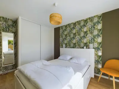 Un ou plusieurs lits dans un hébergement de l'établissement Maison pour 6 adultes avec piscine