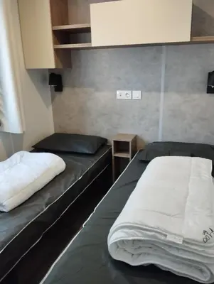 Un ou plusieurs lits dans un hébergement de l'établissement mobile home photovoltaique st jean de monts