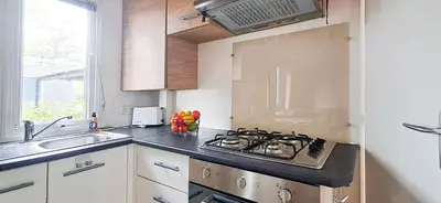 Cuisine ou kitchenette dans l'établissement Naphtase MH01S Le Refuge des Pins