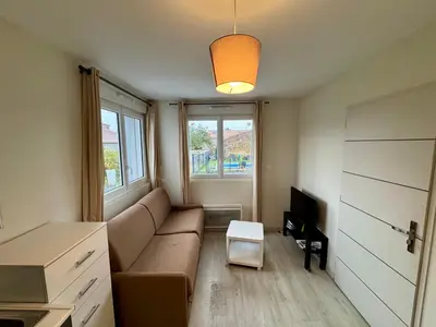 Coin salon dans l'établissement Domaine des 5 Roses - Rose Blanche