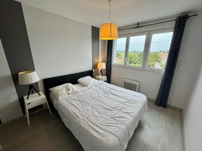 Un ou plusieurs lits dans un hébergement de l'établissement Domaine des 5 Roses - Rose Sombre